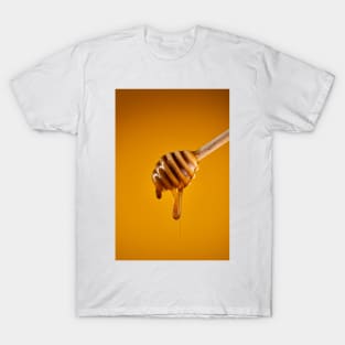 Honey dripping on wooden dipper T-Shirt